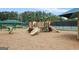 A colorful playground with slides, climbing structures, and swings, offering a fun and safe play area at 6317 Benbrooke Nw Overlook, Acworth, GA 30101