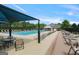 A beautiful community pool with lounge chairs and a covered area, perfect for relaxation and recreation at 6317 Benbrooke Nw Overlook, Acworth, GA 30101