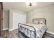 Bedroom with full sized bed and white closet doors at 200 Camp Creek Trail, Peachtree City, GA 30269