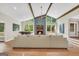 Open concept living room with fireplace, vaulted ceilings, and great natural light at 200 Camp Creek Trail, Peachtree City, GA 30269