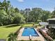 Beautiful pool area with well-maintained landscaping and a relaxing gazebo at 200 Camp Creek Trail, Peachtree City, GA 30269