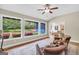 Cozy sunroom with plenty of natural light and garden views at 200 Camp Creek Trail, Peachtree City, GA 30269
