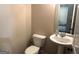 Half-bath with toilet and single sink vanity at 2282 Joplin St, Jonesboro, GA 30236
