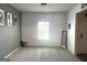 Spacious bedroom with neutral carpet, large window for natural light, and a serene atmosphere at 2282 Joplin St, Jonesboro, GA 30236