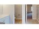 Bathroom with a double door entry showcasing the vanity, toilet and shower at 3402 Milan Ct # 1 Plapprox Sqft 2, Douglasville, GA 30135