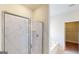Bathroom features a tub and a tiled shower with glass doors at 3402 Milan Ct # 1 Plapprox Sqft 2, Douglasville, GA 30135