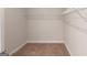 Neutral closet space with carpet and wire shelving, provides efficient storage solutions at 3402 Milan Ct # 1 Plapprox Sqft 2, Douglasville, GA 30135