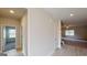Inviting hallway with views into the living room and adjacent bedroom at 3402 Milan Ct # 1 Plapprox Sqft 2, Douglasville, GA 30135