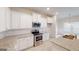 Stylish kitchen features stainless steel appliances, granite countertops, and a bright dining area at 3402 Milan Ct # 1 Plapprox Sqft 2, Douglasville, GA 30135