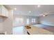 Bright kitchen with a granite island overlooking the living and dining areas at 3402 Milan Ct # 1 Plapprox Sqft 2, Douglasville, GA 30135