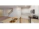 Modern kitchen featuring granite countertops, stainless steel appliances, and white cabinetry at 3402 Milan Ct # 1 Plapprox Sqft 2, Douglasville, GA 30135