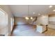 Bright and airy living area with a ceiling fan, access to kitchen, and backyard view at 3402 Milan Ct # 1 Plapprox Sqft 2, Douglasville, GA 30135
