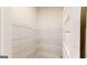 A spacious pantry with white wire shelving offers ample storage space at 3402 Milan Ct # 1 Plapprox Sqft 2, Douglasville, GA 30135