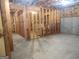 Unfinished basement space with wood framing and concrete floors at 308 Bell Isle, Mcdonough, GA 30252