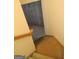 Carpeted basement stairs leading down to the unfinished basement at 308 Bell Isle, Mcdonough, GA 30252