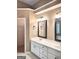 Large bathroom featuring a double vanity and updated lighting at 308 Bell Isle, Mcdonough, GA 30252