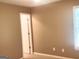 Cozy bedroom featuring neutral paint and carpet with natural light from the window at 308 Bell Isle, Mcdonough, GA 30252