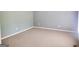Neutral bedroom features beige carpeting and plenty of natural light at 308 Bell Isle, Mcdonough, GA 30252