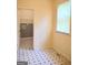 Neutral bedroom with closet and tile flooring at 308 Bell Isle, Mcdonough, GA 30252