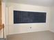 Finished bonus room featuring large chalkboard ready for Gathering fun and imagination at 308 Bell Isle, Mcdonough, GA 30252