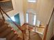Bright foyer featuring hardwood floors, stairs, and a front door with sidelights at 308 Bell Isle, Mcdonough, GA 30252