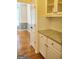 Eat-in kitchen area with hardwood floors and granite countertops at 308 Bell Isle, Mcdonough, GA 30252