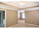 Spacious main bedroom with tray ceilings, carpeted floors, and bathroom access at 308 Bell Isle, Mcdonough, GA 30252
