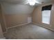 Bedroom featuring neutral carpet, a ceiling fan, a single window, and storage area at 235 Woodstream Way, Fayetteville, GA 30214