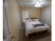 Bedroom featuring a bed, neutral carpet, a ceiling fan, and 2 door closet at 235 Woodstream Way, Fayetteville, GA 30214