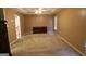 Spacious main bedroom with a ceiling fan, tray ceiling, and large windows at 235 Woodstream Way, Fayetteville, GA 30214