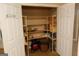 Pantry with shelving providing ample space for organized storage of food items and kitchen essentials at 235 Woodstream Way, Fayetteville, GA 30214