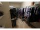 Spacious walk-in closet with ample storage and well-organized hanging racks at 235 Woodstream Way, Fayetteville, GA 30214