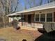 Quaint brick home with shutters and front porch, a classic design at 1858 Sahara Se Dr, Atlanta, GA 30316