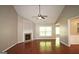 Inviting living room features a fireplace, hardwood floors, and lots of natural light at 3350 Cooper Woods Dr, Loganville, GA 30052
