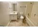 Neutral bathroom featuring a vanity, toilet and tub/shower combo with tiled flooring at 6026 Woodcreek Dr, Woodstock, GA 30188