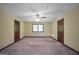 Bedroom features soft carpet, neutral paint, and a ceiling fan for comfortable living at 428 Turner Rd, Mcdonough, GA 30252