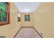 Small room with two windows providing natural light and tile flooring at 428 Turner Rd, Mcdonough, GA 30252
