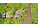 Aerial view showing the house, pond, and surroundings, offering a glimpse of the expansive property at 679 Bo Bo Banks Rd, Grantville, GA 30220