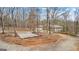 Beautiful view of the side of the house surrounded by trees at 679 Bo Bo Banks Rd, Grantville, GA 30220