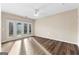 Spacious living room with natural light and sliding glass doors leading to the outside at 679 Bo Bo Banks Rd, Grantville, GA 30220