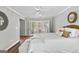 The main bedroom has a seating area and an outside view at 679 Bo Bo Banks Rd, Grantville, GA 30220