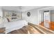 Bright main bedroom with a horse-themed wall art and a view to the bathroom at 679 Bo Bo Banks Rd, Grantville, GA 30220