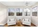 Cozy sunroom featuring great natural light and relaxing seating at 679 Bo Bo Banks Rd, Grantville, GA 30220