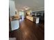 Spacious kitchen with white cabinets and granite counter tops at 223 Rivers Rd, Fayetteville, GA 30214