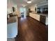 Kitchen with white cabinets and stainless steel appliances at 223 Rivers Rd, Fayetteville, GA 30214
