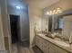 Bathroom features include double sinks, granite countertops, and tile floors at 320 Weatherly Drive, Fayetteville, GA 30214