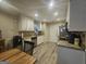 Inviting kitchen featuring granite counters, white cabinets, and modern appliances at 320 Weatherly Drive, Fayetteville, GA 30214
