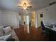 Open living room boasts hardwood flooring, two closets and natural light, perfect for comfortable living at 320 Weatherly Drive, Fayetteville, GA 30214