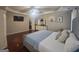 Main Bedroom features a trey ceiling, hardwood floors, plenty of natural light, and walk-in closet at 320 Weatherly Drive, Fayetteville, GA 30214