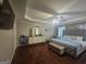 Main Bedroom features include trey ceiling, hardwood floors, plenty of natural light, and designer decor at 320 Weatherly Drive, Fayetteville, GA 30214